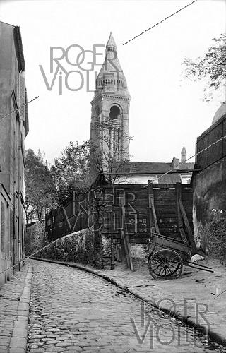 Paris Montmartre (18th arrondissement). Rue Cortot, with the Sacré-Coeur bell tower, circa 1900.