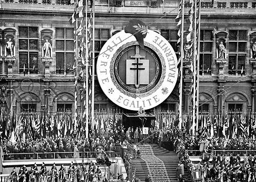 World War II. Charles de Gaulle (1890-1970), French General, presenting the Cross of the Liberation to the City of Paris, on April 2nd, 1945.