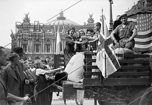 World War II. Liberation of Paris. Resupplying convoy on the place de l'Opéra. August 1944.