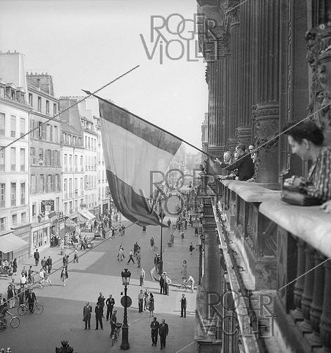 World War II. The mayor of the Xth arrondissement showing the French flag, August 1944.